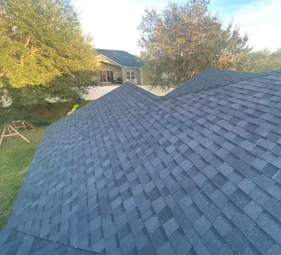 Completed shingle roof over a backyard in Central Florida